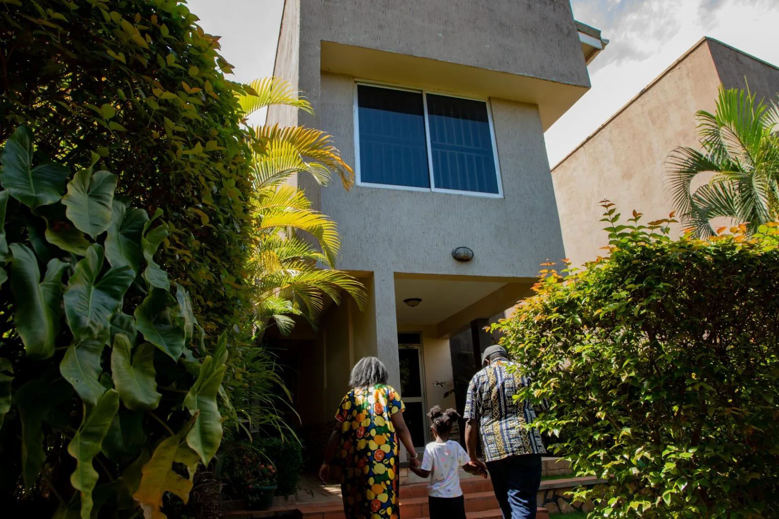 The gated, green compound of The Pearl Cottages with lush vertical planting